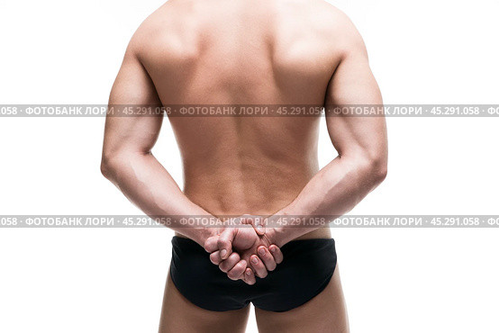 Handsome muscular bodybuilder posing on white background. Isolated studio shot. Стоковое фото, фотограф Станислав Тарко / Фотобанк Лори