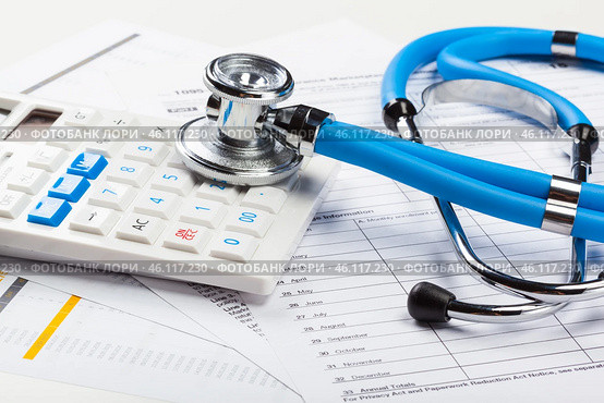 Health care costs. Stethoscope and calculator. Стоковое фото, фотограф Сергей Толмачёв / Фотобанк Лори