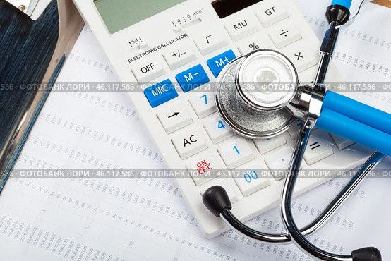 Health care costs. Stethoscope and calculator. Стоковое фото, фотограф Сергей Толмачёв / Фотобанк Лори
