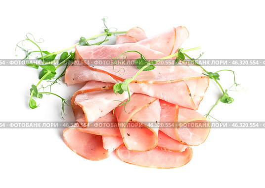 Heap of sliced ham with microgreen on white background. Стоковое фото, фотограф Pixel_shot / Фотобанк Лори