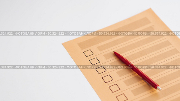 high angle uncompleted voting questionnaire. Стоковое фото, агентство Ingram Publishing / Фотобанк Лори