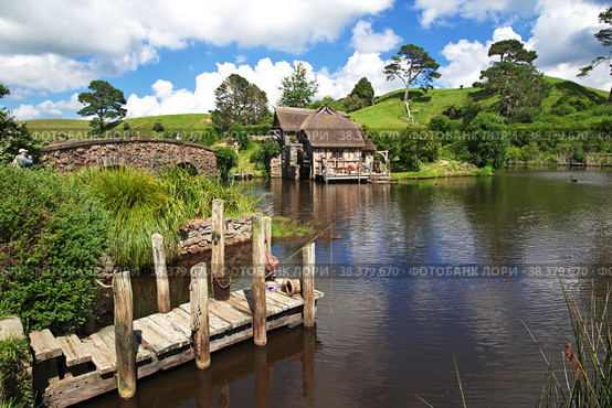 Hobbiton, New Zealand - 15 Dec 2018. Hobbiton is theme Park in New Zealand. Редакционное фото, фотограф Сергей Стрелков / Фотобанк Лори