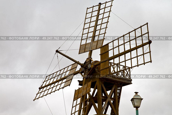 hole windmills in  isle of lanzarote africa spain   and the sky . Стоковое фото, агентство Ingram Publishing / Фотобанк Лори