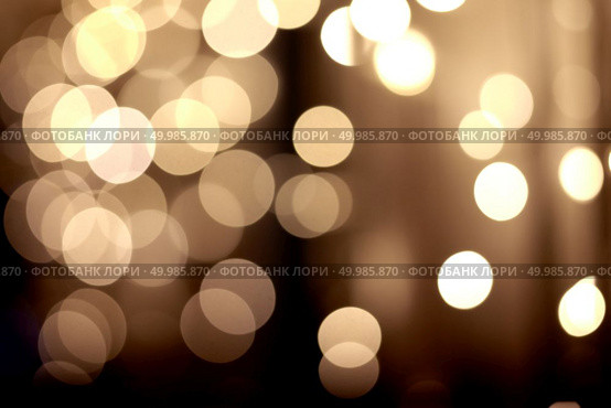 Holiday background. Festive abstract background with bokeh defocused lights. festive golden bokeh background. Стоковое фото, агентство Ingram Publishing / Фотобанк Лори