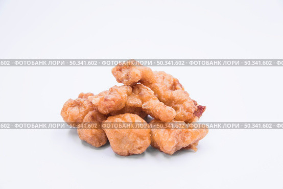 homemade crispy chicken popcorn white background. Стоковое фото, агентство Ingram Publishing / Фотобанк Лори