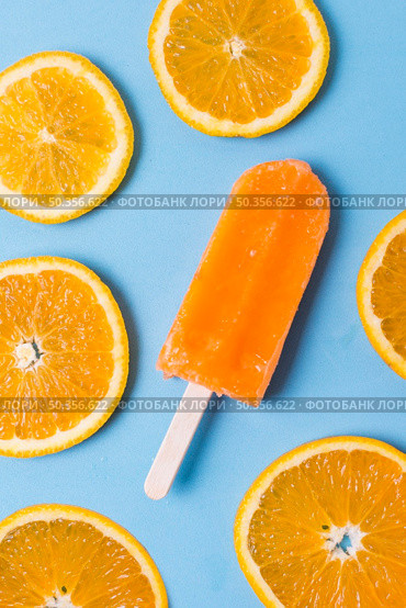 homemade popsicle ice cream slices orange. Стоковое фото, агентство Ingram Publishing / Фотобанк Лори