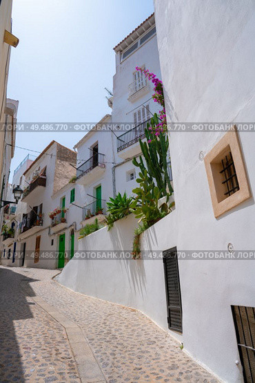 Ibiza Eivissa downtown Dalt Vila facades in Balearic Islands. Стоковое фото, агентство Ingram Publishing / Фотобанк Лори