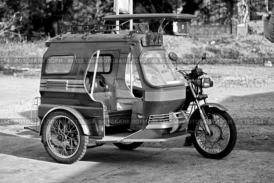 in asia philipphines the typical tuk tuk motorbike for tourist. Стоковое фото, агентство Ingram Publishing / Фотобанк Лори