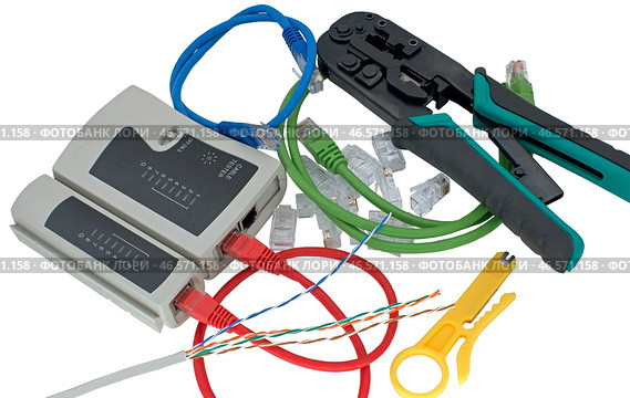 Инструмент для обжима интернет-кабеля витой пары на белом фоне. Tool for crimping of internet cable on a white background. Стоковое фото, фотограф Татьяна Д / Фотобанк Лори