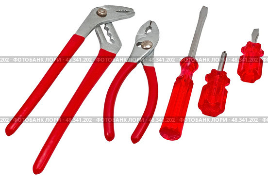 Инструменты - отвёртки и гаечные ключи на белом фоне.  Tools - screwdrivers and wrenches on a white background. Стоковое фото, фотограф Татьяна Д / Фотобанк Лори
