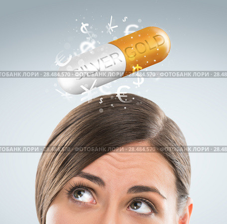 Investment concept. Pretty business woman with currency symbols. Стоковое фото, фотограф Kirill Kedrinskiy / Ingram Publishing / Фотобанк Лори
