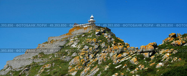 Islas Cies islands lighthouse monte del Faro Cies in Vigo of Galicia. Стоковое фото, агентство Ingram Publishing / Фотобанк Лори
