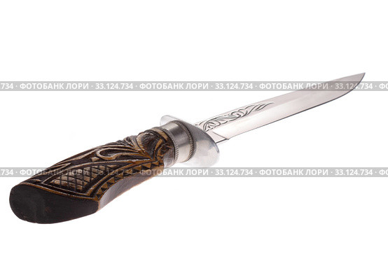 isolated dagger with a wooden handle and engraved blade. Стоковое фото, фотограф Sergiy Artsaba / PantherMedia / Фотобанк Лори