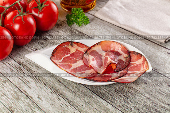 Italian Cured pork neck slices. Стоковое фото, фотограф Андрей Старостин / Фотобанк Лори
