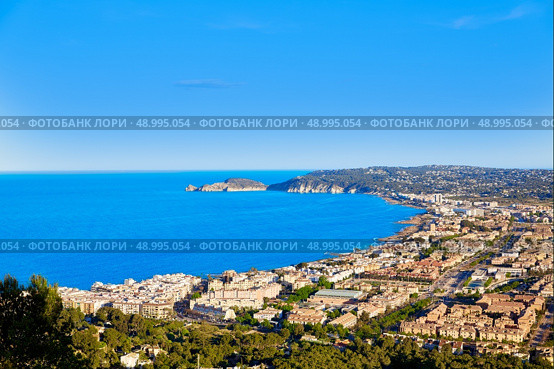 Javea Xabia aerial skyline with port bay and village in Alicante Spain. Стоковое фото, агентство Ingram Publishing / Фотобанк Лори