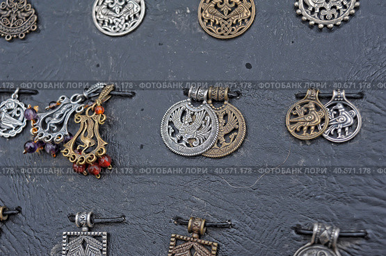 Jewelry with Slavic and Scandinavian symbols on sale. Стоковое фото, фотограф Анна Кривицкая / Фотобанк Лори