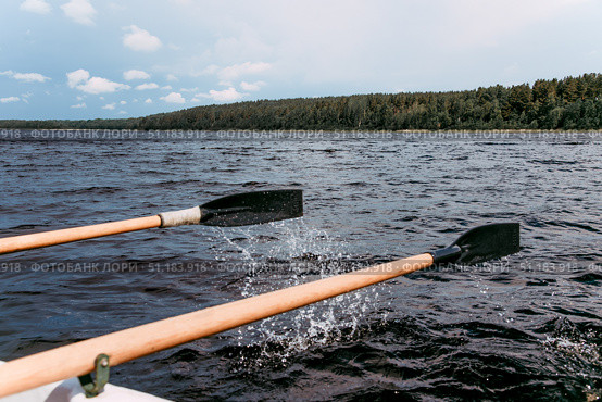 Karelia, Russia, 9 June 2019, Tourists sail on wooden paddle boat on Lake Ladoga. Стоковое фото, фотограф Spirit River / Фотобанк Лори