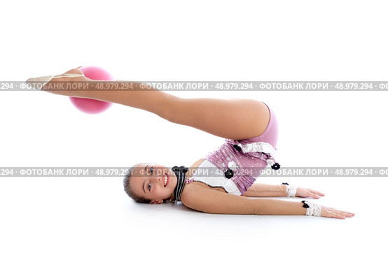 Kid girl ball rhythmic gymnastics exercise on white background. Стоковое фото, агентство Ingram Publishing / Фотобанк Лори