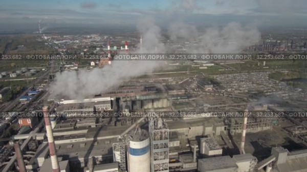 Компания HeidelbergCement. Завод по производству сухих строительных смесей. Вид с воздуха. 01 - 2. HeidelbergCement. Plant for the production of dry mixes. Aerial view. 01 - 2. (2019 год). Редакционное видео, видеограф Евгений Романов / Фотобанк Лори