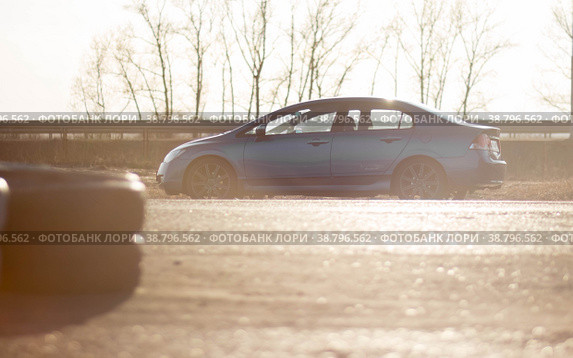 KRASNOYARSK, RUSSIA - April 15, 2021: Blue car. Sedan Honda Civic 4D FD1 2007. Beautifull wheels. Редакционное фото, фотограф Плотников Дмитрий / Фотобанк Лори