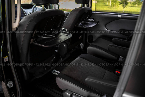 KRASNOYARSK, RUSSIA - July 17, 2023: Black Nissan Serena. Редакционное фото, фотограф Плотников Дмитрий / Фотобанк Лори