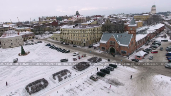 Круглая Башня и здание Центрального рынка на Рыночной площади в Выборге, зима (2017 год). Редакционное видео, видеограф Кекяляйнен Андрей / Фотобанк Лори