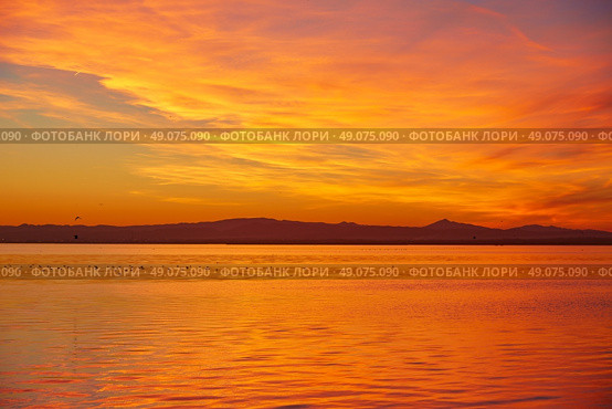 La Albufera lake sunset in El Saler of Valencia at Spain. Стоковое фото, агентство Ingram Publishing / Фотобанк Лори