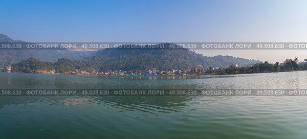 Lake Phewa - at the second largest lake in Nepal located in the Pokhara Valley near Pokhara and Sarangkot mountain. Стоковое фото, агентство Ingram Publishing / Фотобанк Лори