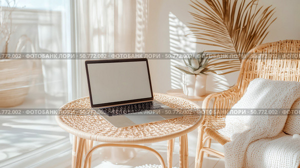Laptop on a Rattan Table in a Sunlit Room. Стоковое AI-изображение, AI-художник Данила Большаков / Фотобанк Лори