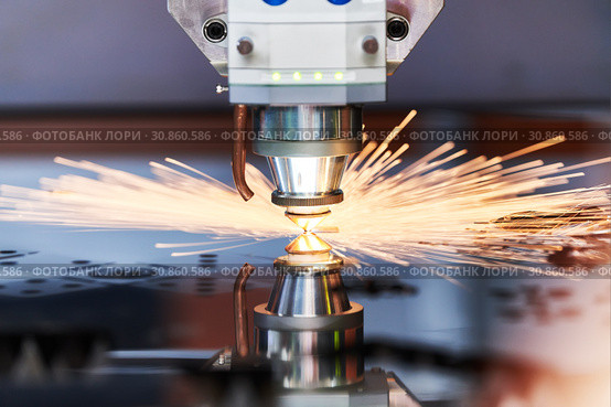 Laser cutting. Metal machining with sparks. Стоковое фото, фотограф Дмитрий Калиновский / Фотобанк Лори