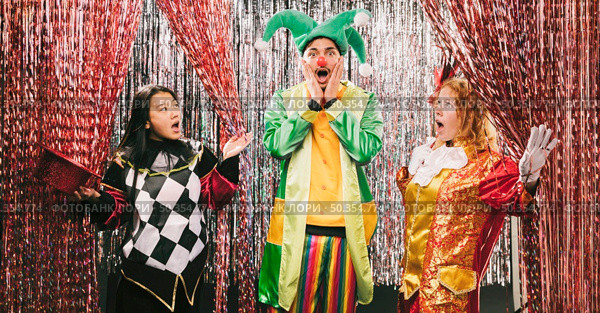 low angle costumed friends party. Стоковое фото, агентство Ingram Publishing / Фотобанк Лори