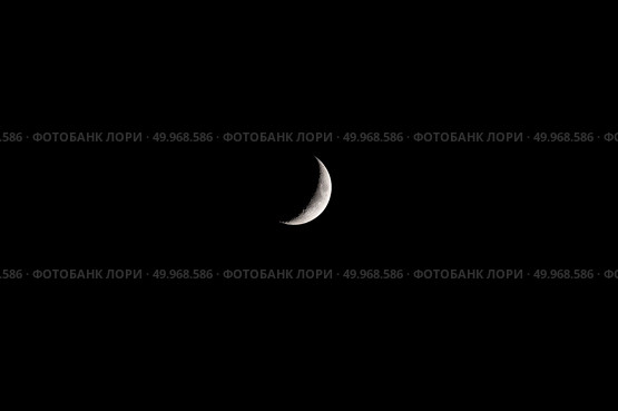 Луна в фазе первой четверти на фоне черного неба. Вид с северного полушария Земли. Стоковое фото, фотограф Алексей Винников / Фотобанк Лори