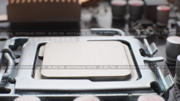 Macro view of the CPU on a computer motherboard. Camera  move. Стоковое видео, видеограф Mixail59 / Фотобанк Лори