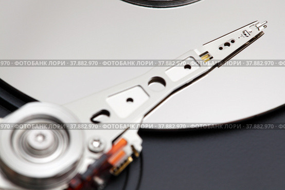 Магнитная головка HDD крупным планом. Стоковое фото, фотограф Александр Гаценко / Фотобанк Лори