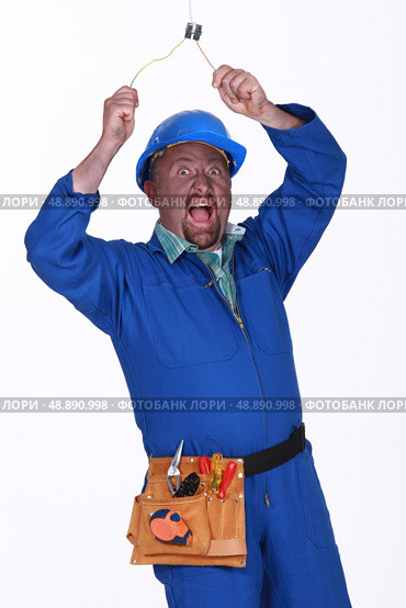 Man being electrocuted. Стоковое фото, агентство Ingram Publishing / Фотобанк Лори