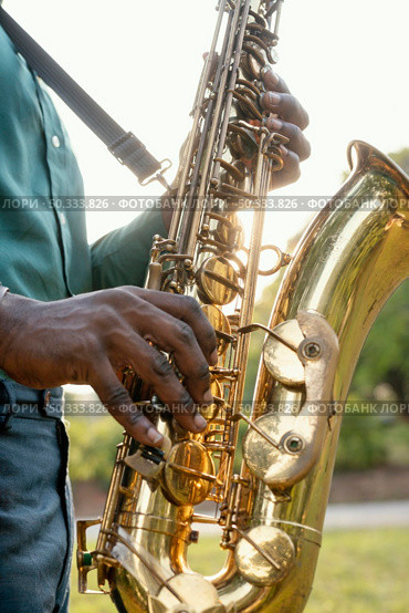 man celebrating international jazz day. Стоковое фото, агентство Ingram Publishing / Фотобанк Лори