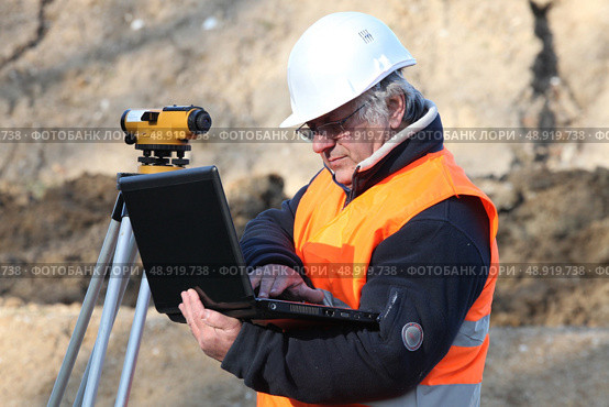 Man conducting a survey. Стоковое фото, агентство Ingram Publishing / Фотобанк Лори