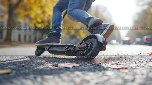 Man falling off an electric scooter. Стоковое AI-изображение, AI-художник Кирилл Черезов / Фотобанк Лори