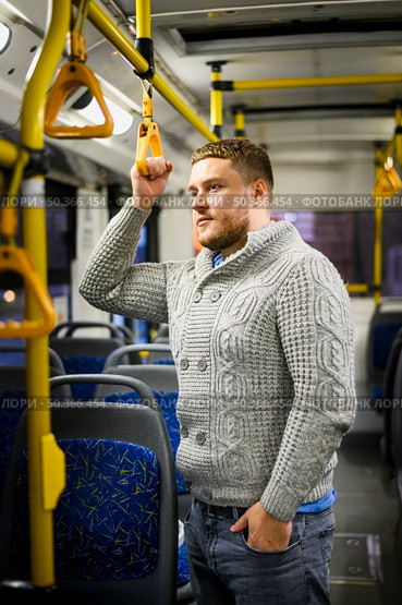 man gray blouse jeans traveling by bus. Стоковое фото, агентство Ingram Publishing / Фотобанк Лори