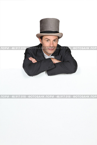 Man in a top hat. Стоковое фото, агентство Ingram Publishing / Фотобанк Лори