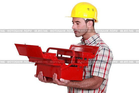 Man looking at empty tool box. Стоковое фото, агентство Ingram Publishing / Фотобанк Лори