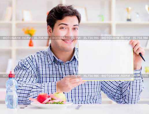 Man on special diet programm to lose weight. Стоковое фото, фотограф Elnur / Фотобанк Лори