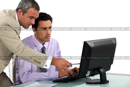 Man pointing out an error. Стоковое фото, агентство Ingram Publishing / Фотобанк Лори