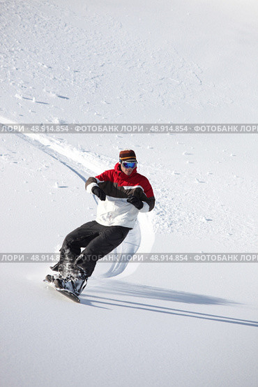 Man snowboarding. Стоковое фото, агентство Ingram Publishing / Фотобанк Лори
