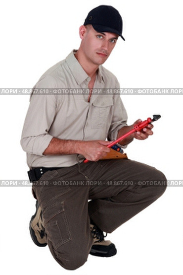 Man with vernier caliper. Стоковое фото, агентство Ingram Publishing / Фотобанк Лори