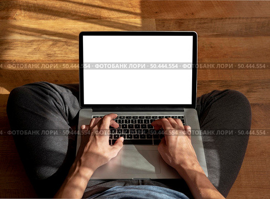 man working with laptop home during quarantine. Стоковое фото, агентство Ingram Publishing / Фотобанк Лори