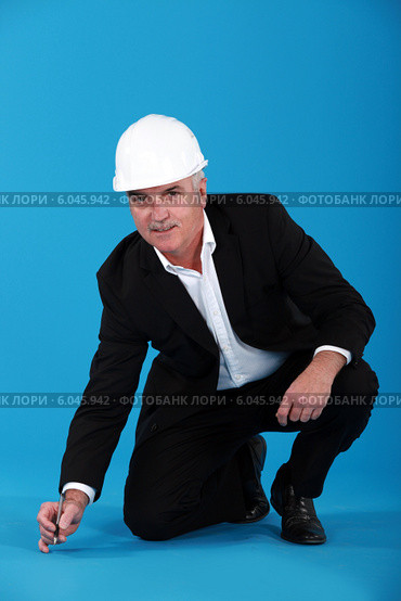 Man writing on the floor. Стоковое фото, фотограф Phovoir Images / Фотобанк Лори