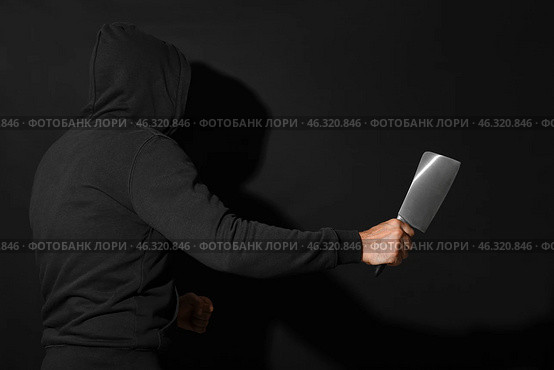 Maniac with cleaver on black background. Стоковое фото, фотограф Pixel_shot / Фотобанк Лори