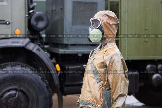 Mannequin dressed in chemical protection suit and gas mask. Стоковое фото, фотограф Олег Белов / Фотобанк Лори