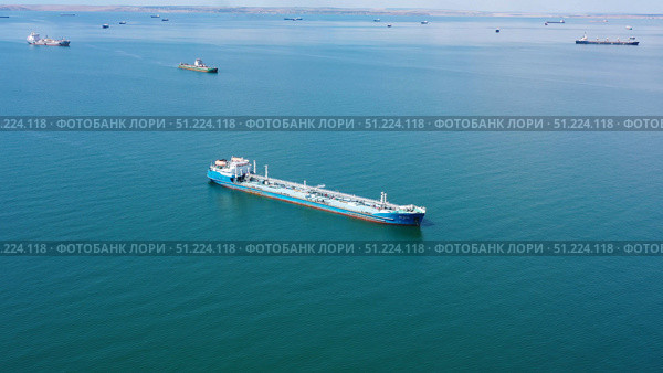 Many cargo ships waiting for port entrance. Стоковое фото, фотограф Михаил Коханчиков / Фотобанк Лори